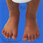 Children's book page with illustrated hairy legs and feet, titled "Monster feet" with text prompt for drawing.