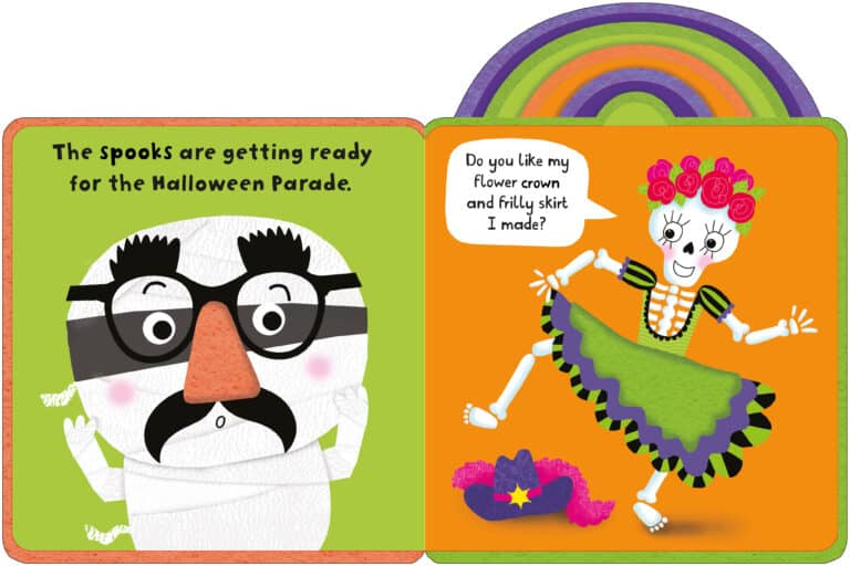 An open children's book shows two colorful pages. The left page features a moustached character with glasses and the text, "The Spooks are getting ready for the Halloween Parade." The right page shows a skeleton character with a flower crown and colorful dress, saying, "Do you like my flower crown and frilly skirt I made?" A decorated hat lies below.