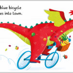 A red dragon rides a blue bicycle with a basket full of apples. Fruits and a banana peel are scattered on the ground. A smaller blue dragon rides a tricycle behind. Text reads: "She rides a blue bicycle when she goes into town.