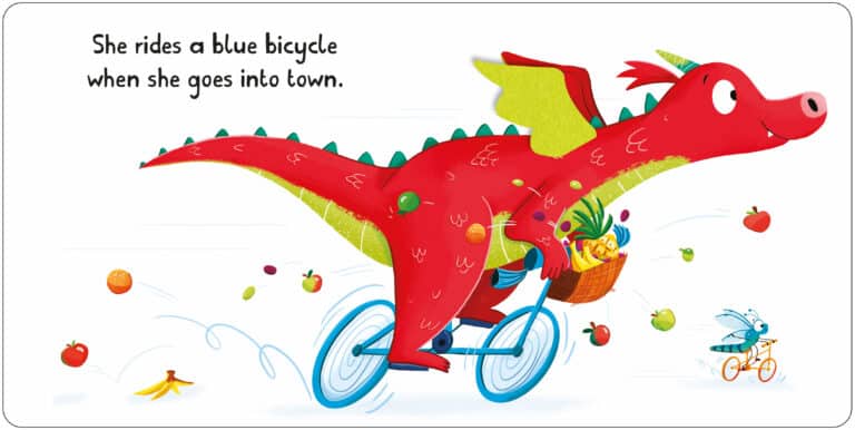 A red dragon rides a blue bicycle with a basket full of apples. Fruits and a banana peel are scattered on the ground. A smaller blue dragon rides a tricycle behind. Text reads: "She rides a blue bicycle when she goes into town.
